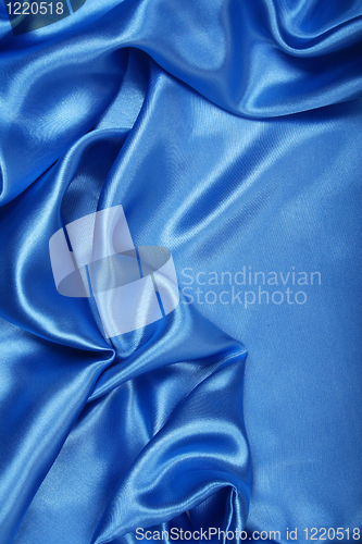 Image of Smooth elegant blue silk as background 