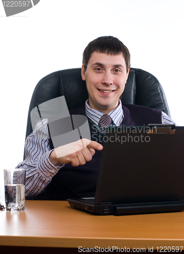 Image of Portrait of a young businessman with laptop