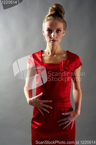 Image of Sexy slim woman in red dress