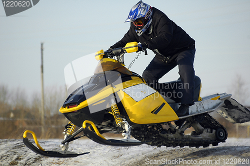 Image of Flying of ski mobile rider