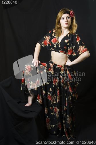 Image of Portrait of girl at black