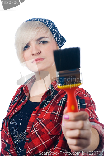 Image of Young woman with paintbrush