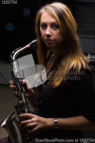 Image of Woman with saxophone