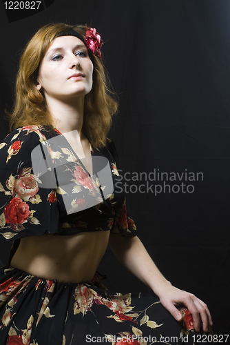 Image of Portrait of girl at black