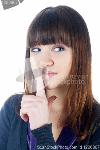 Image of Woman gesturing to silence