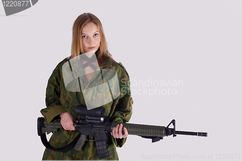 Image of Woman with gun on white