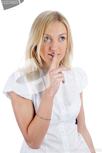 Image of Woman gesturing to silence