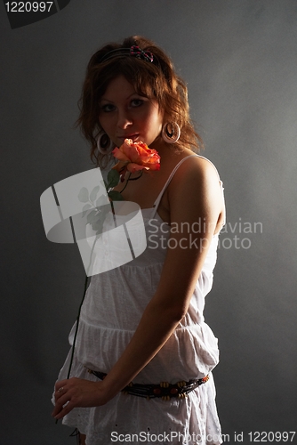 Image of Young Lady with red rose
