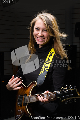 Image of Woman with guitar