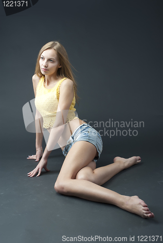 Image of Sitting pretty girl