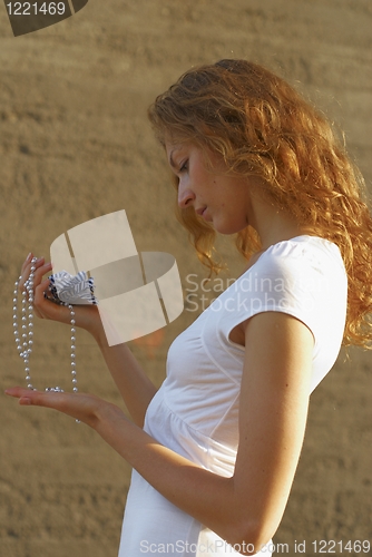 Image of Woman with beads