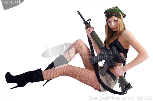 Image of Woman with gun on white
