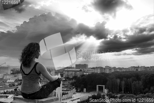 Image of Girl meditating at sunbeam
