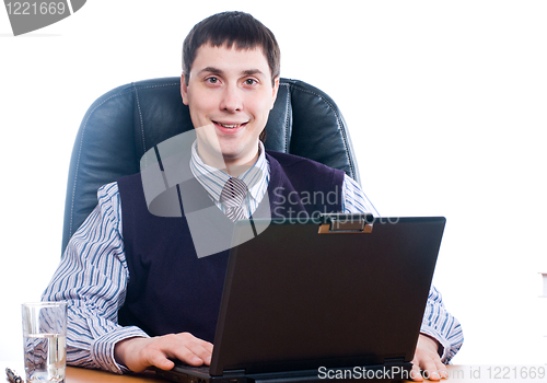 Image of Portrait of a young businessman with laptop