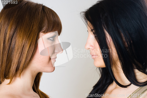 Image of Two beautiful women posing together