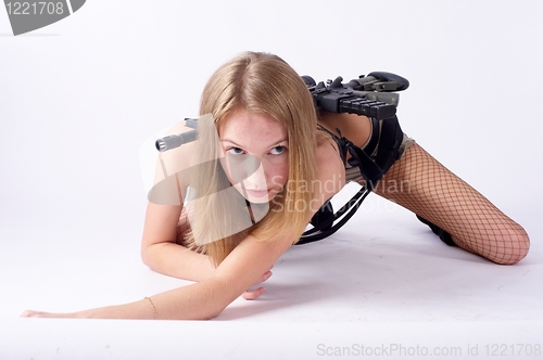 Image of Pretty woman with rifle