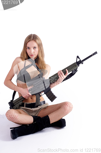 Image of Woman with gun on white