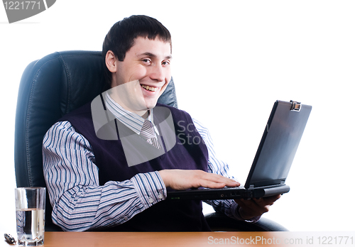 Image of Portrait of a young businessman with laptop