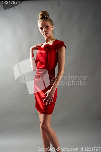 Image of Sexy slim woman in red dress