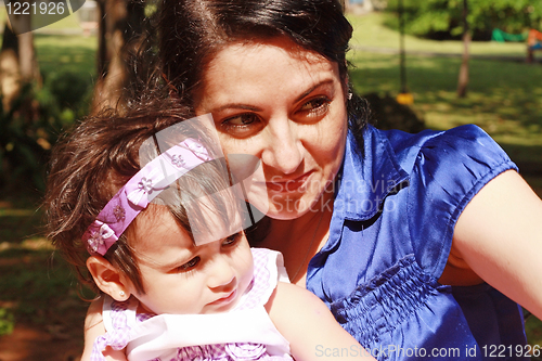 Image of Mom and Daughter watching the attractions of the park