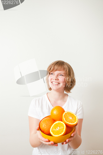 Image of Woman with oranges