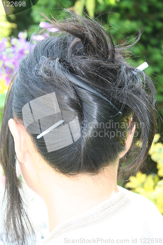 Image of Black hair with  hair-slide