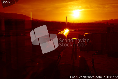 Image of landing at sunset