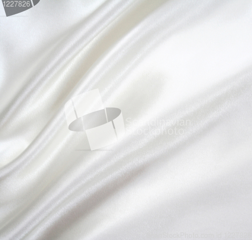 Image of Smooth elegant white silk as background 