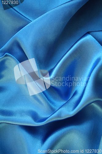 Image of Smooth elegant blue silk as background 
