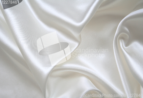 Image of Smooth elegant white silk as background 