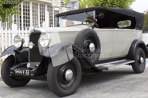 Image of White classic car.