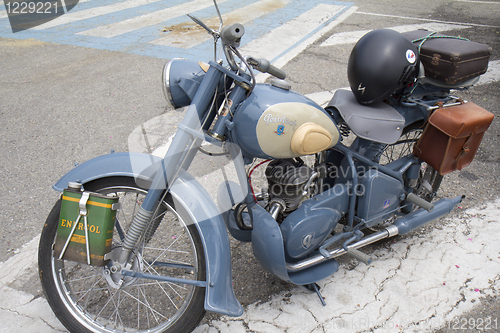 Image of Vintage motorcycle parked.