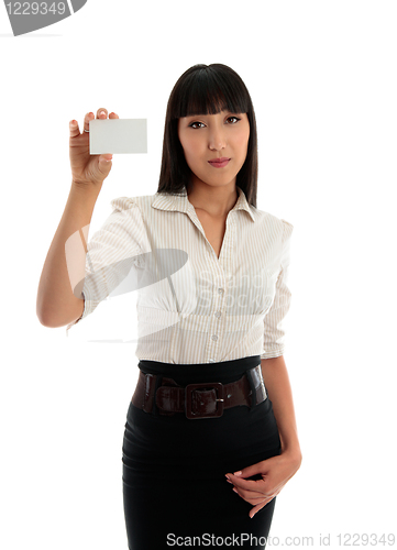 Image of Beautiful business woman holding a credit club or business card