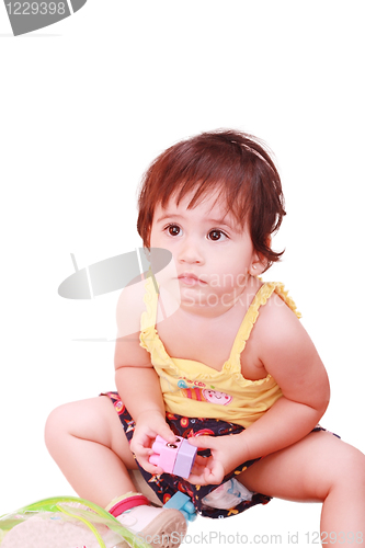 Image of baby plays with toy over white background 