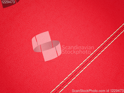 Image of Diagonal stitched red leather background