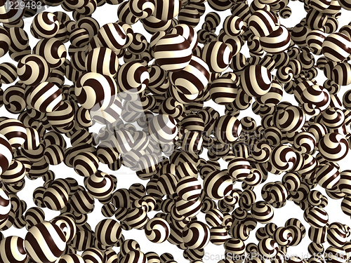 Image of Striped chocolate bonbons over white 