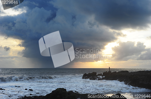 Image of Fisherman at sunset