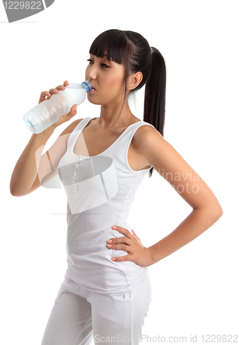 Image of Fit healthy girl drinking water