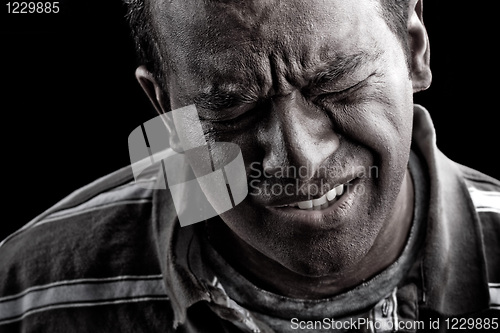 Image of Man In Extreme Anguish or Pain