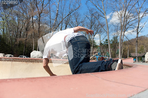 Image of Skateboarder Skating the Bowl