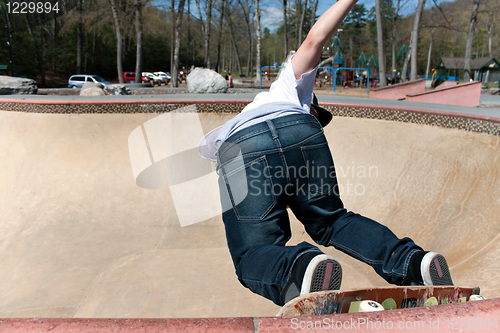 Image of Skateboarder Skating the Bowl