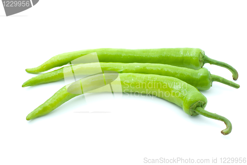 Image of Three green chili peppers
