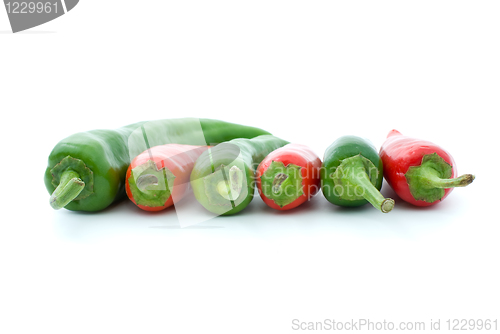 Image of Some red and green hot peppers - side view