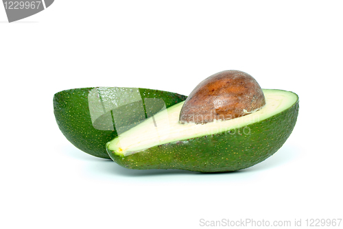 Image of Two avocado (alligator pear) halves with kernel