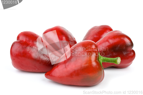 Image of Five red sweet peppers