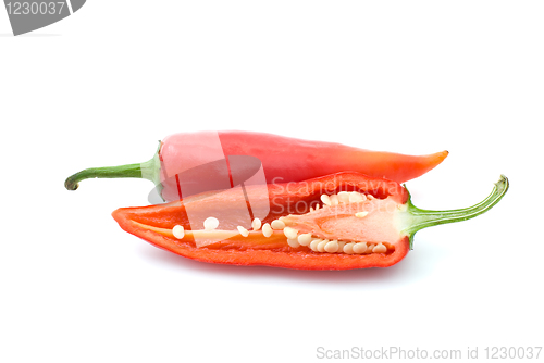 Image of Whole and half red hot peppers