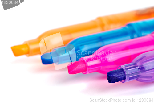 Image of Opened different colored felt-tip markers close-up