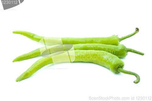 Image of Three yellow-green chili peppers