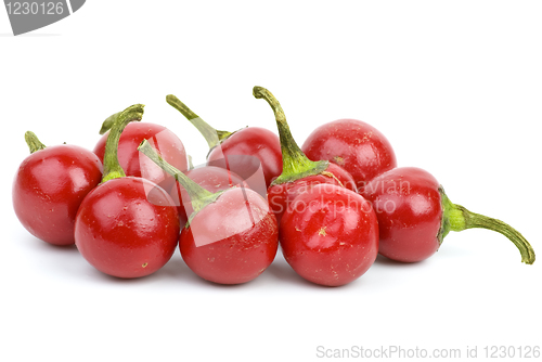 Image of Some round red hot peppers