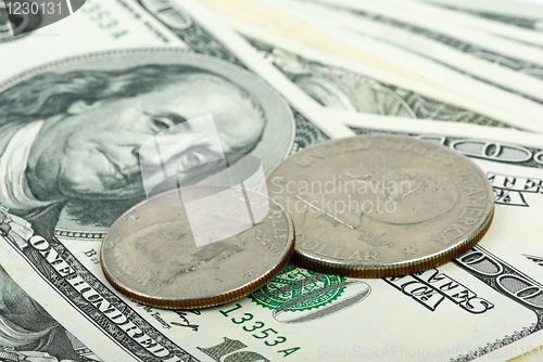 Image of American dollars: bills and coins close-up